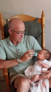 Having a bottle with Grandpa Stu while Mama and Mommy are on a date!