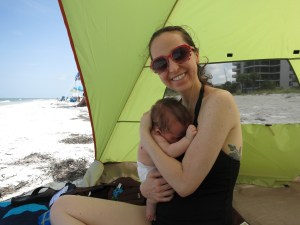 Janet and Jonah in the super hot beach cabana. (Note the naked baby - we had to undress him to cool down.)
